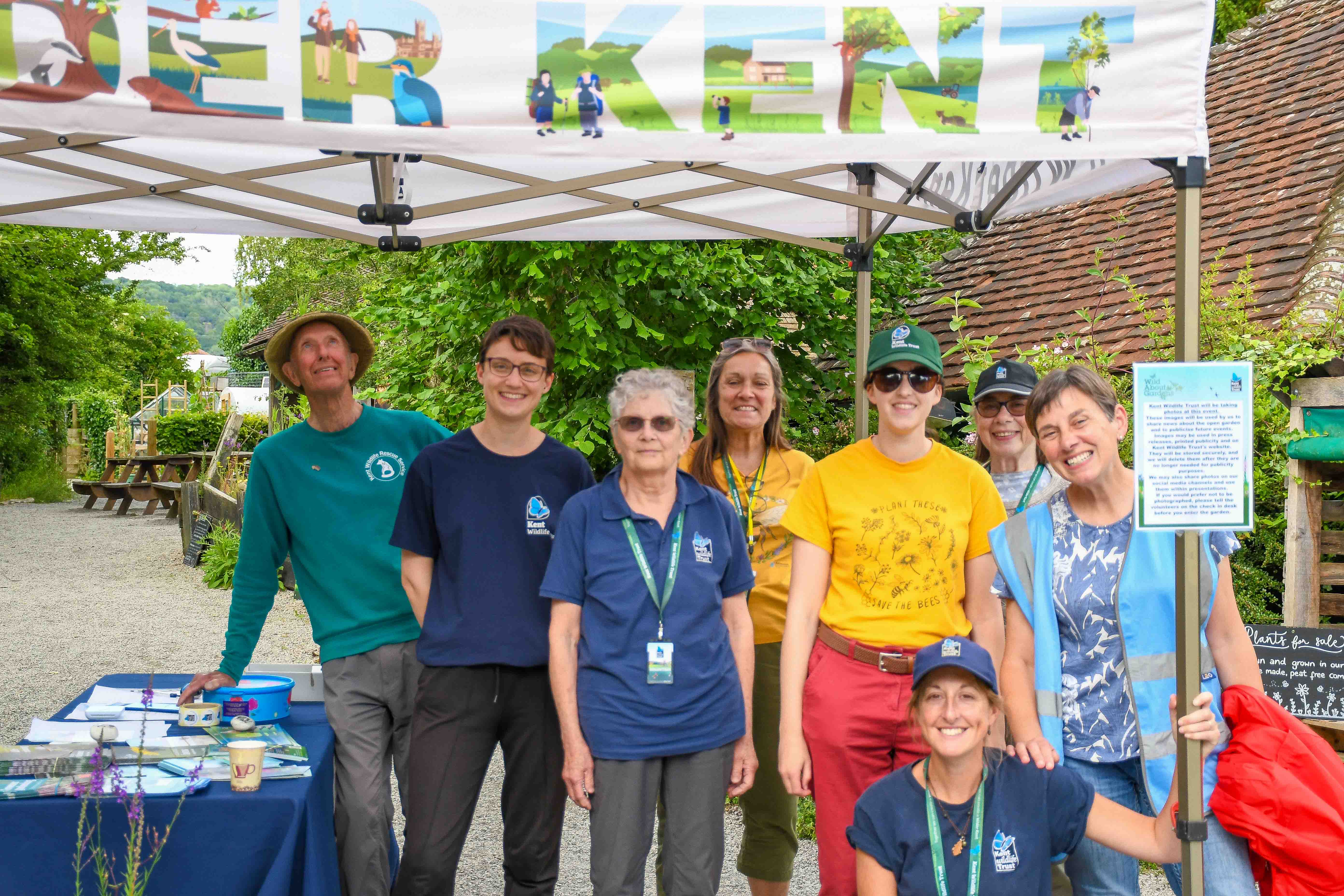 wild about gardens volunteers with ellen” style=