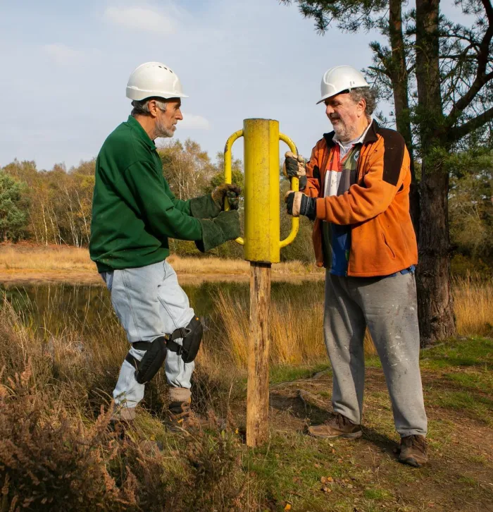 volunteers fencing equipment