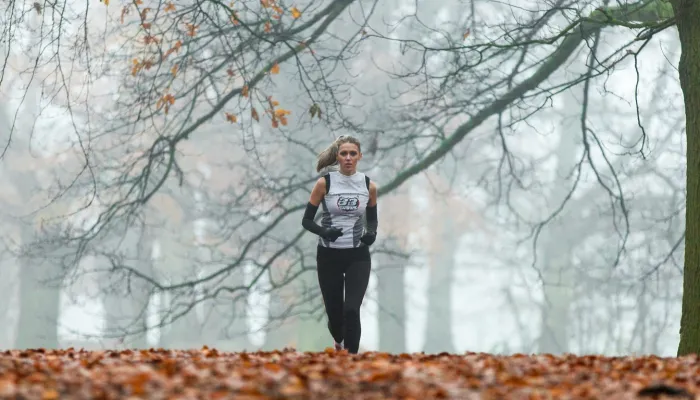 A person running in athletic clothes for a fundraiser