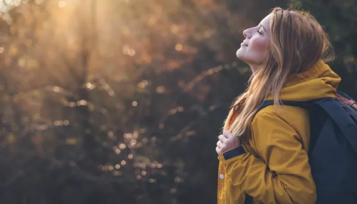 woman in autumn sunshine