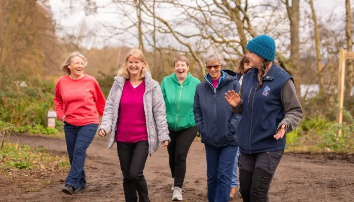 People walking on reserve with warden