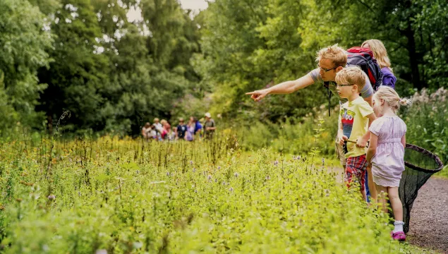 Family outdoors, photo by Thomas Alexander