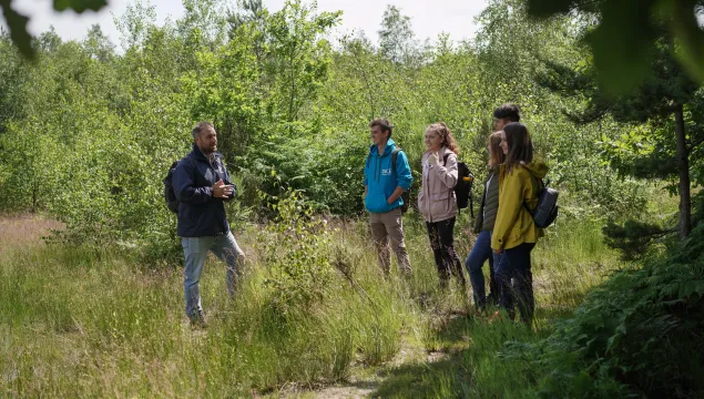 Wilder Kent Safari at the Blean where guide is speaking to group outdoors