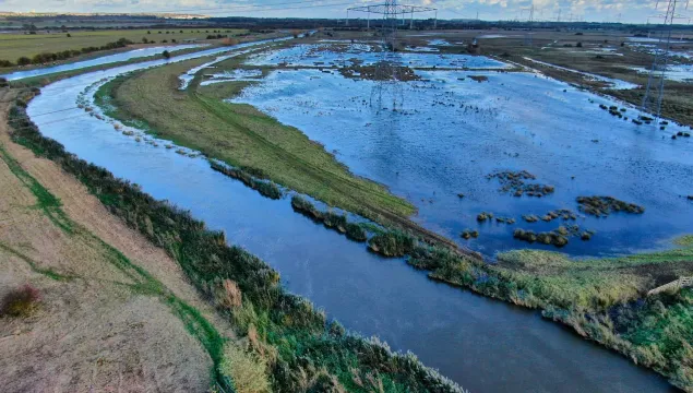 The Minster Marshes with pylons built in the water.