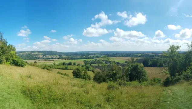 A panorama of Polhill Bank on a sunny day with blue skies.