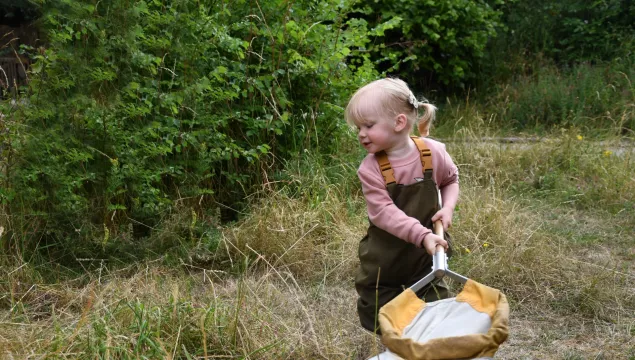 Toddler with a sweep net