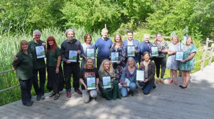 Wilder kent awards 2023 winners grouped together holding their certificates