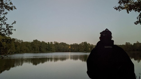 Back of a person looking across Sevenoaks lakes for Bats