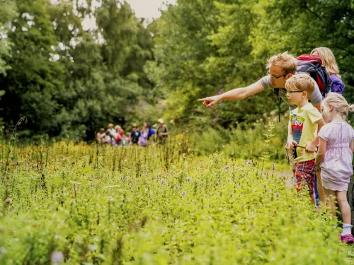 Family outdoors, photo by Thomas Alexander