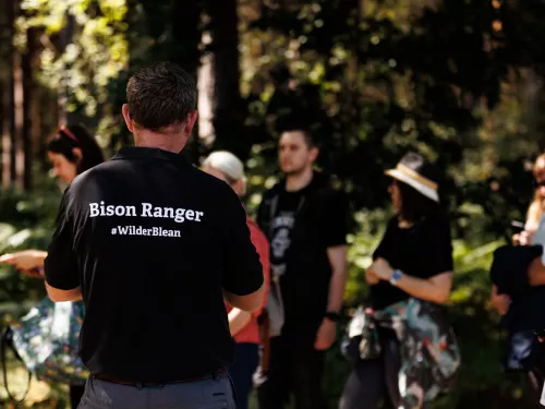 Bison ranger at the bison festival looking out into the festival and the people - photo by Tom Cawdron