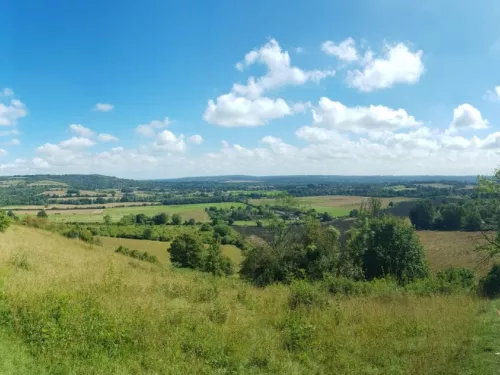 A panorama of Polhill Bank on a sunny day with blue skies.