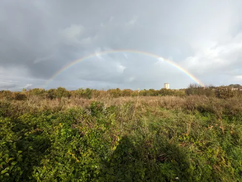 Dane Valley Woodland with a rainbow over it - this is a local wildlife site managed for nature by the community