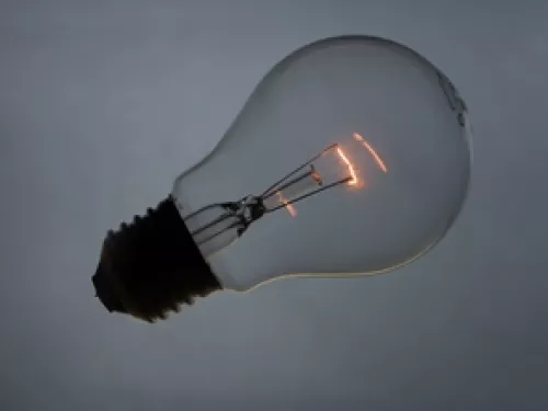 light bulb with glowing filament