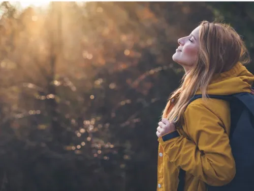 woman in autumn sunshine